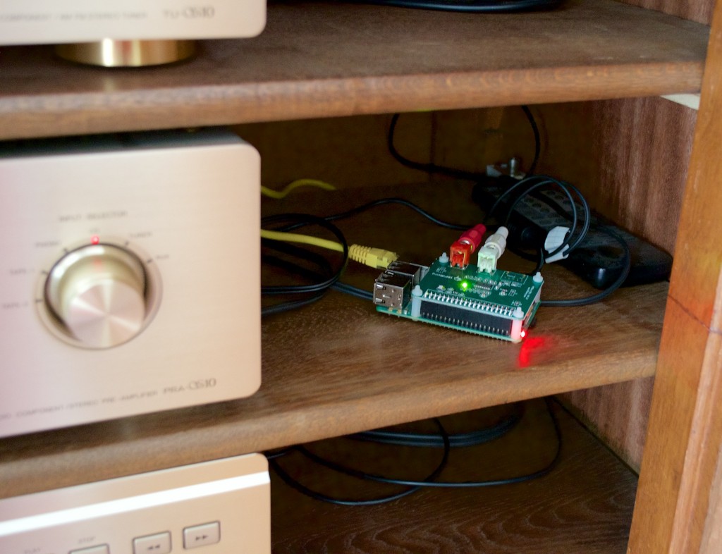 Raspberry Pi with HifiBerry DAC next to Denon amp.